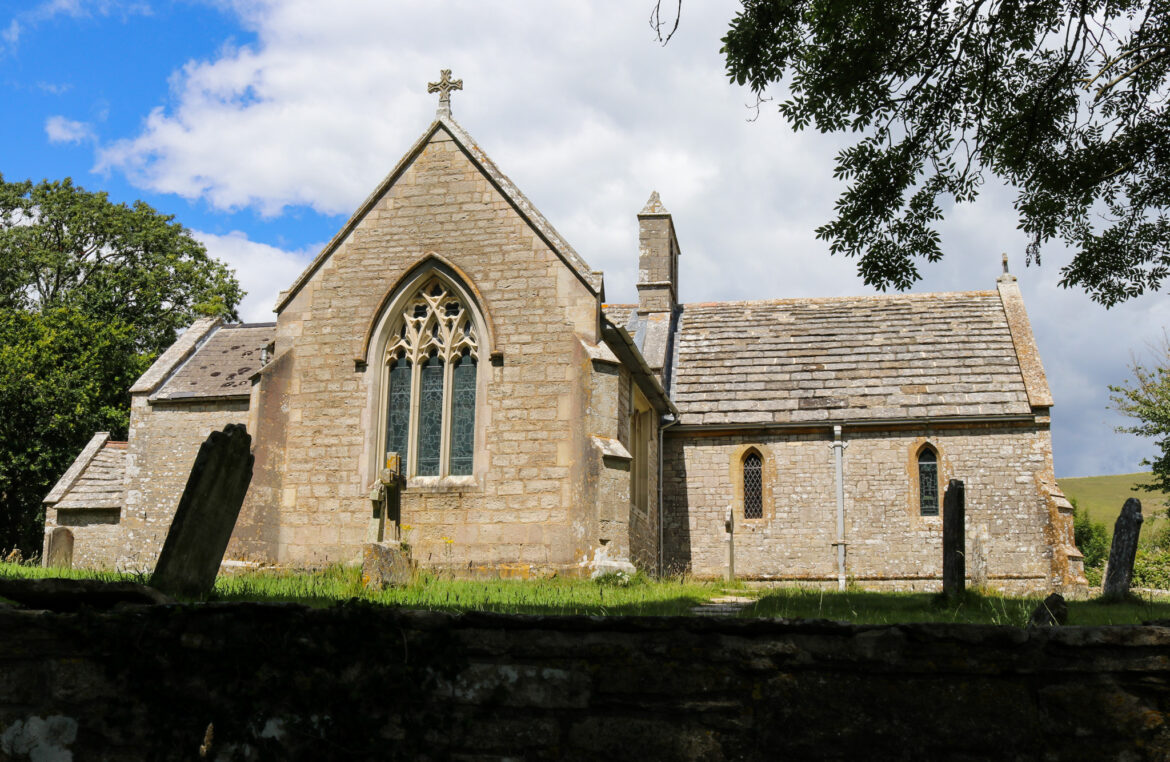 Side view of St Mary's Church & graveyard in Tyneham village