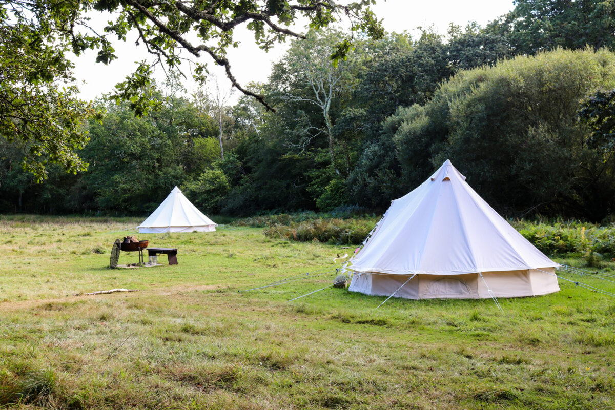 Bell tent area with barbecue at the Blue Pool, Furzebrook