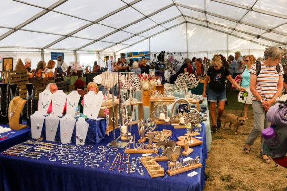 People browsing stalls at the Swanage Folk Festival craft fair