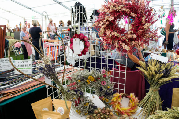 Dried flower arrangements in the craft tent at Swanage Folk Festival
