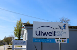 Welcome to Ulwell Holiday Park sign near Reception building