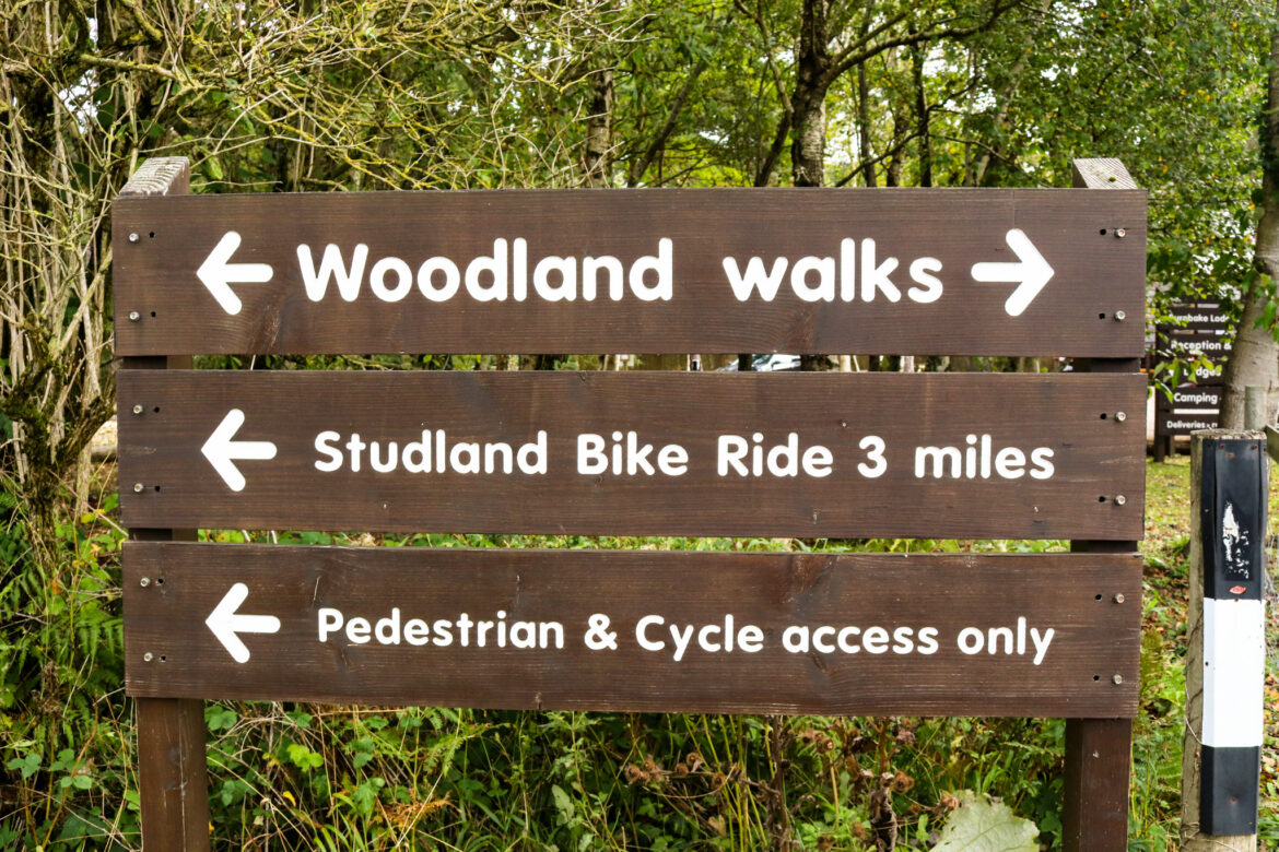 Sign for woodland walks and cycle ride to Studland at the Burnbake Campsite