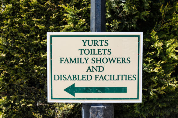 Family showers and disabled facilities sign at Herston Caravan & Camping Park
