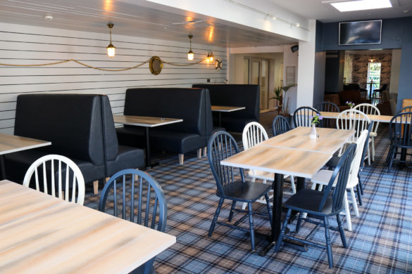 Dining tables and chairs at Ulwell Holiday Park's Village Inn