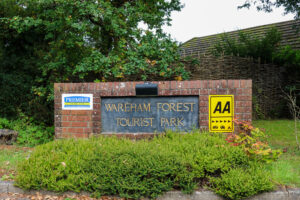 5 AA pennants sign at the entrance to the Wareham Forest Tourist Park