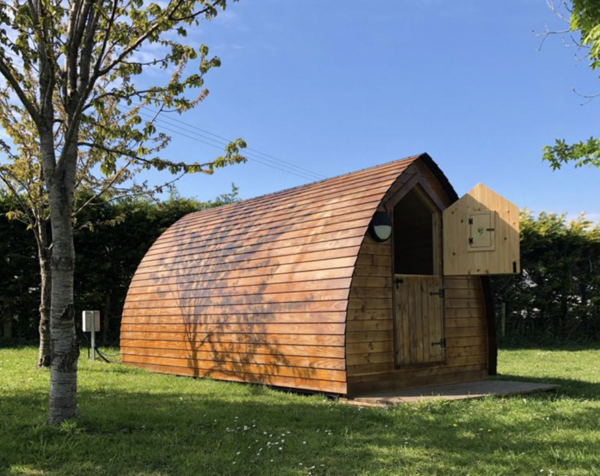 A timber camping pod with stable door at East Creech Farm Campsite
