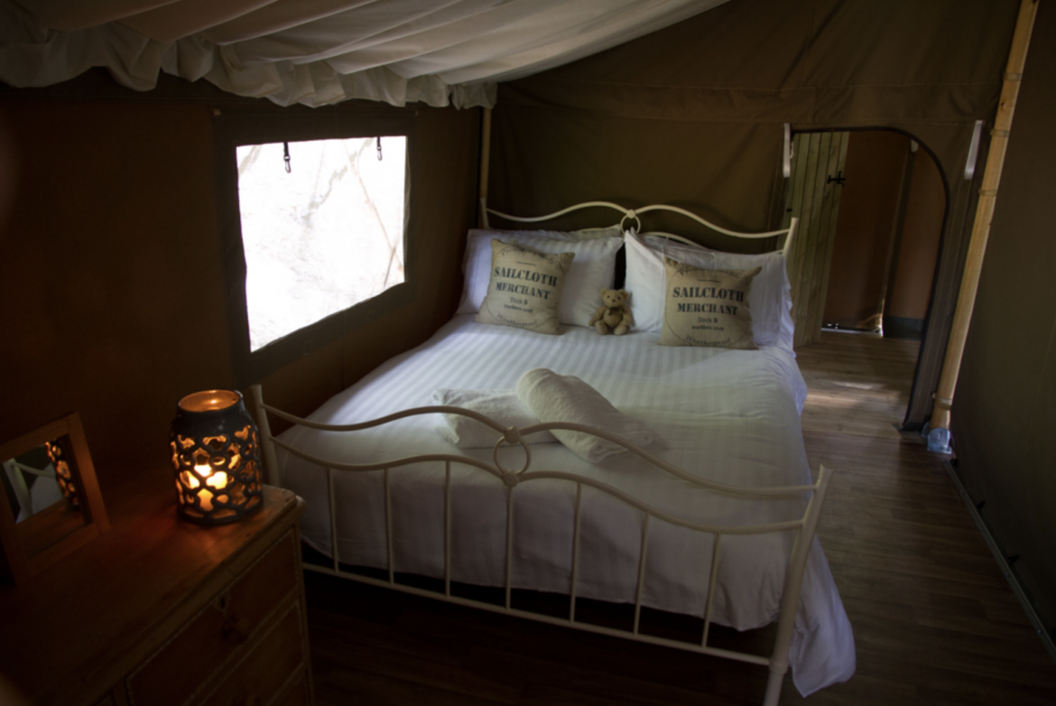 Bedroom of one of Knaveswell Farm 's safari tents, Swanage