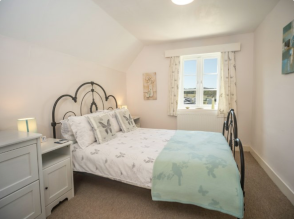 Double bedroom of Norden Cottage, available for holiday rental