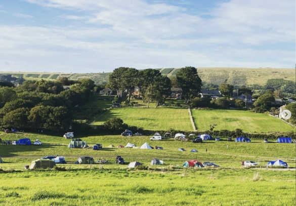 Tents pitched at Harman's Cross's Quarr Campsite, near Swanage