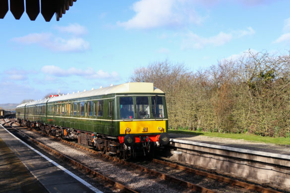 A Swanage Railway train pulling into the station at Harman's Cross