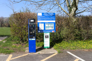 JustPark & payment information board and ticket machine at Swanage's North Beach car park