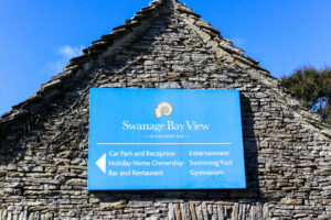 Entrance sign outside the Swanage Bay View Holiday Park
