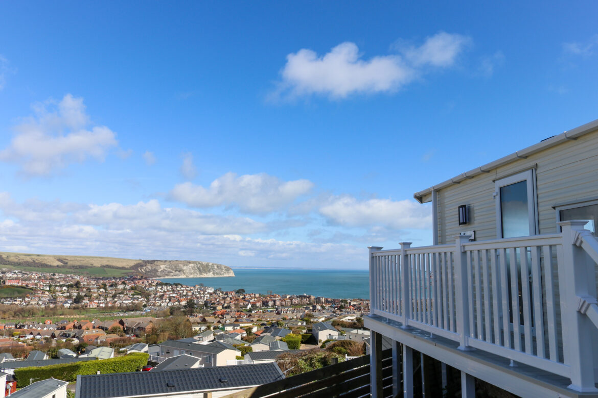 A balcony around one of the caravans at Swanage Bay View Holiday Park, looking across the town