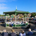 Swanage Town Band playing in the evening sunshine