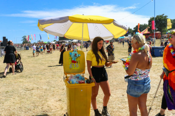 People buying official Camp Bestival merchandise