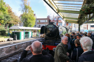 People taking photographs of the Flying Scotsman loco in Swanage