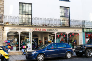 Parking spaces outside Swanage outdoor clothing shop Jurassic Outdoor