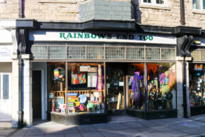 Clothes & accessories on display in the window of Rainbow's End