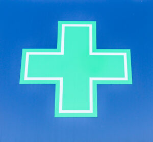 Pharmacy cross sign in Swanage