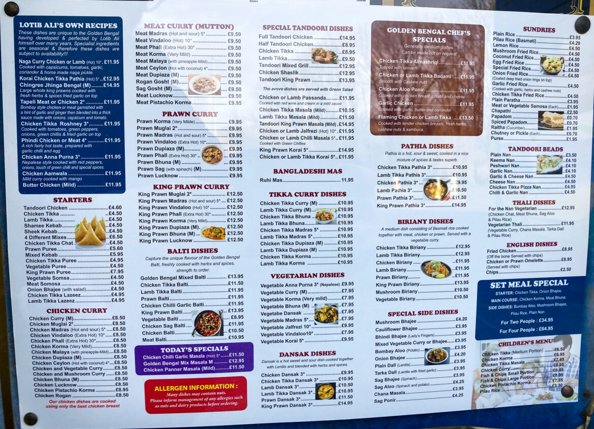 Indian Restaurant menu in window of Swanage's Golden Bengal