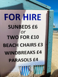 Sun-beds, beach chairs, windbreaks & parasols for hire from The Cabin