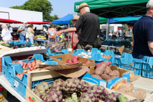 Browsing the veg stalls at the Swanage Friday Market